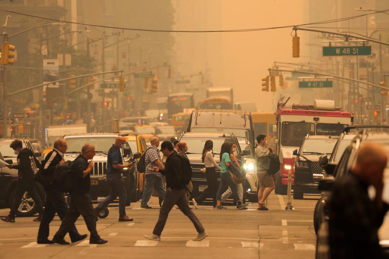 Haze and smoke shroud Manhattan skyline from Canadian wildfires in New York