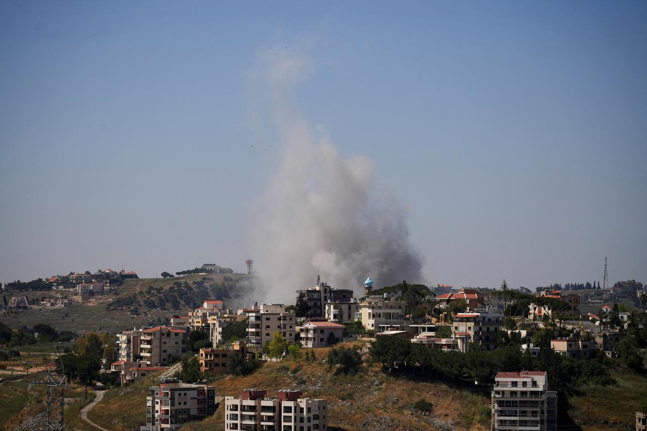 Smoke billows from southern Lebanon, following Israeli strikes, as seen from Nabatieh