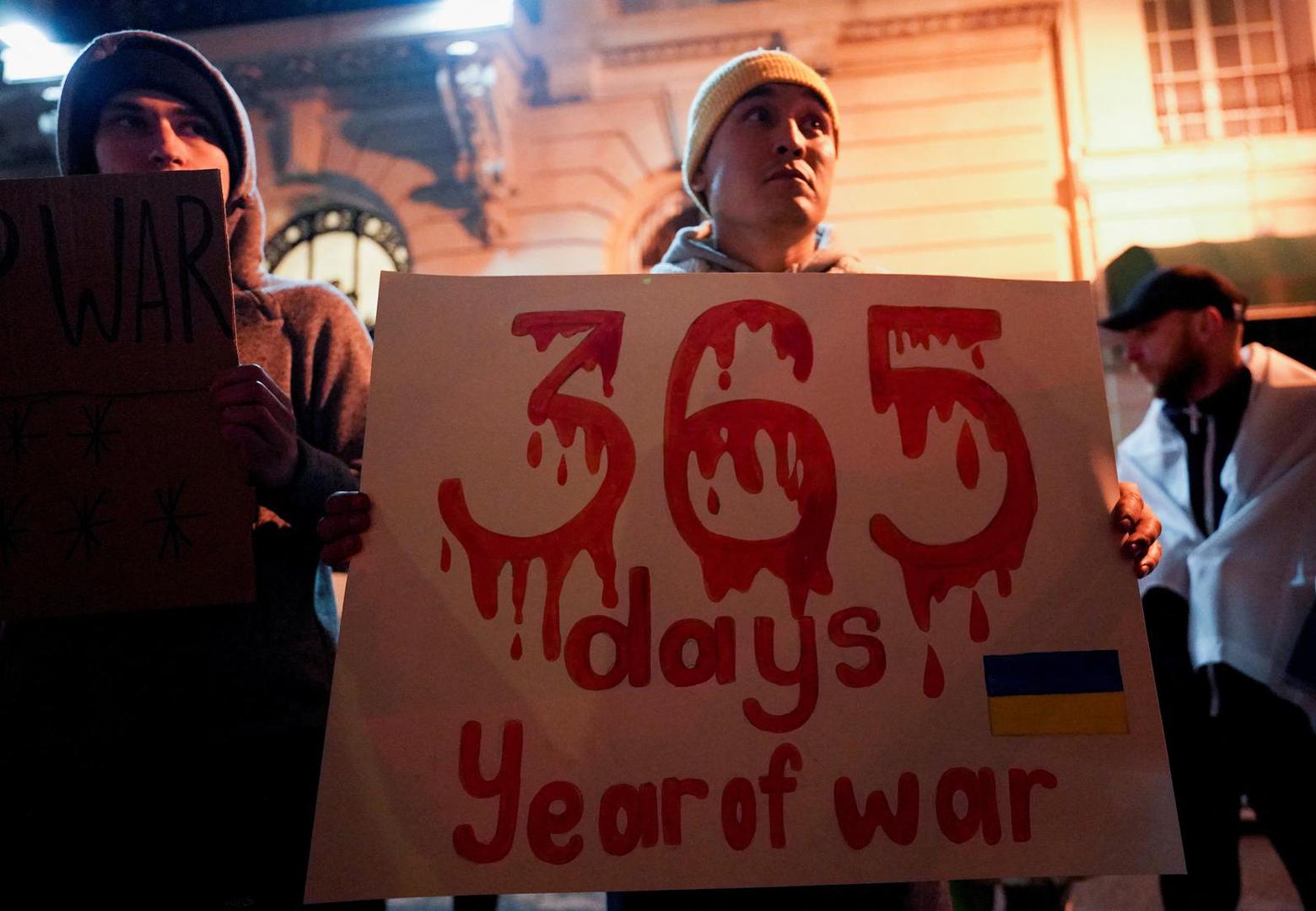 A demonstrator holds a banner during "The Year of Terror: Russians Against the War" rally to show their support for Ukraine on the eve of the war's anniversary, outside the Russian Consulate in New York City, New York, U.S., February 23, 2023.  REUTERS/David 'Dee' Delgado Photo: David Dee Delgado/REUTERS