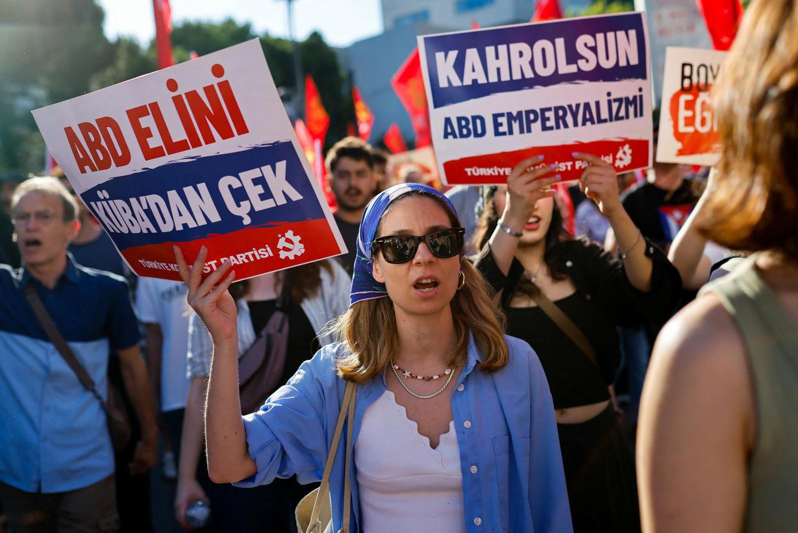 A woman holds a placard during a protest, ahead of NATO leaders' summit, in Istanbul, Turkey, July 5, 2026. REUTERS/Kemal Aslan Photo: KEMAL ASLAN/REUTERS