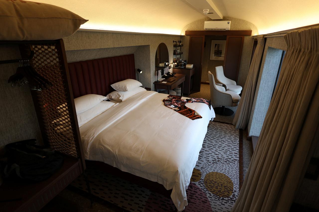 Suspended over a wildlife river, South African hotel train defies lockdown odds