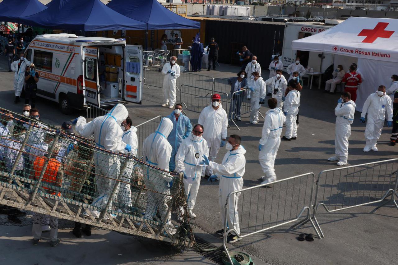 Rescued migrants disembark Sea-Watch 5 ship in Salerno