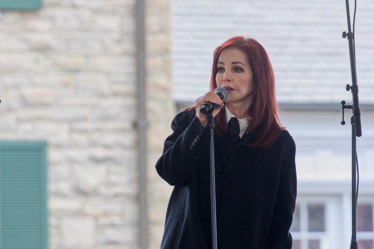 Music fans attend a public memorial for singer Lisa Marie Presley at Graceland in Memphis