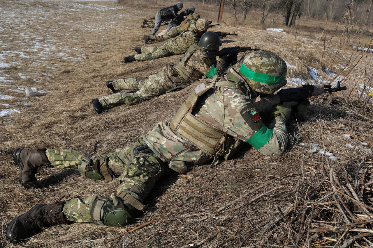 Retired foreign military professionals conduct a military exercise for Ukrainian service members outside of Kharkiv