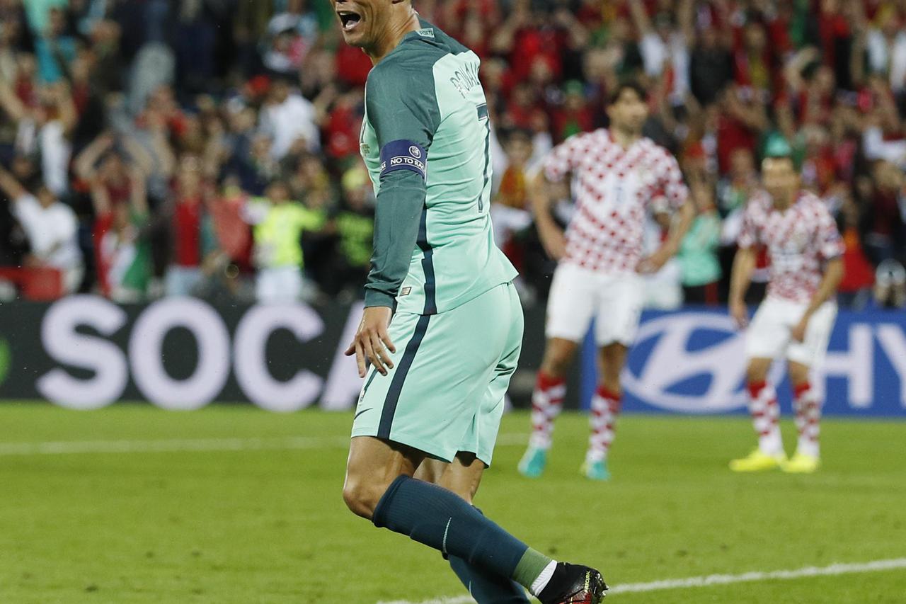 Football Soccer - Croatia v Portugal - EURO 2016 - Round of 16 - Stade Bollaert-Delelis, Lens, France - 25/6/16 Portugal's Cristiano Ronaldo celebrates after Ricardo Quaresma scores their first goal  REUTERS/Lee Smith Livepic