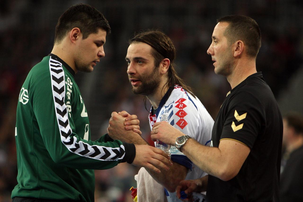'07.03.2010., Zagreb, Hrvatska -  10. kolo rukometne lige prvaka, grupa C, Arena Zagreb, utakmica izmedju RK Zagreb Croatia osiguranje i HSV Hamburg. Ivan Pesic, Ivano Balic, Damir Kajba Photo: Dalibo