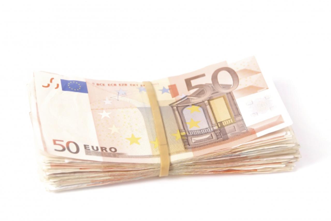 'Stack of fifty euro notes with rubber band'