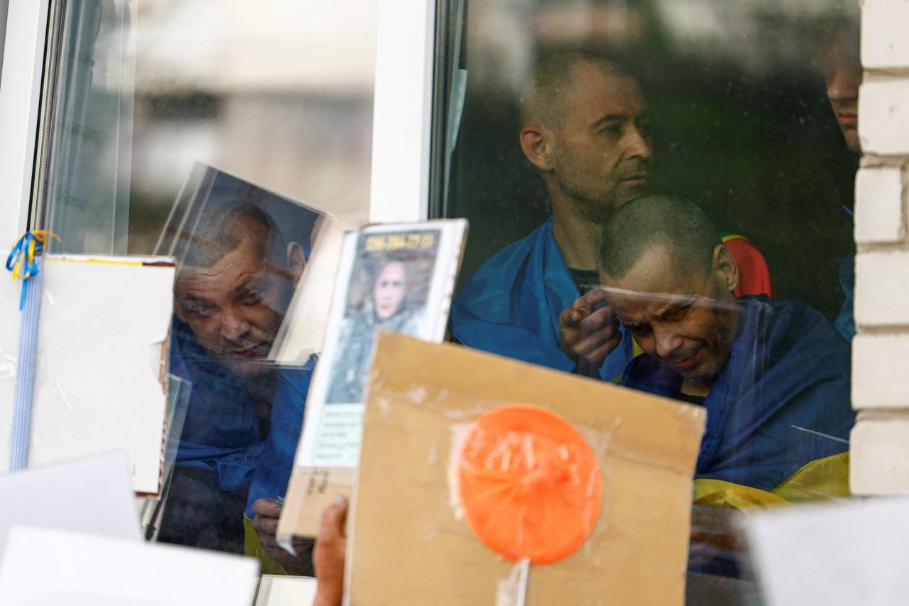 Freed Ukrainian POW return after a swap in an undisclosed location in Ukraine