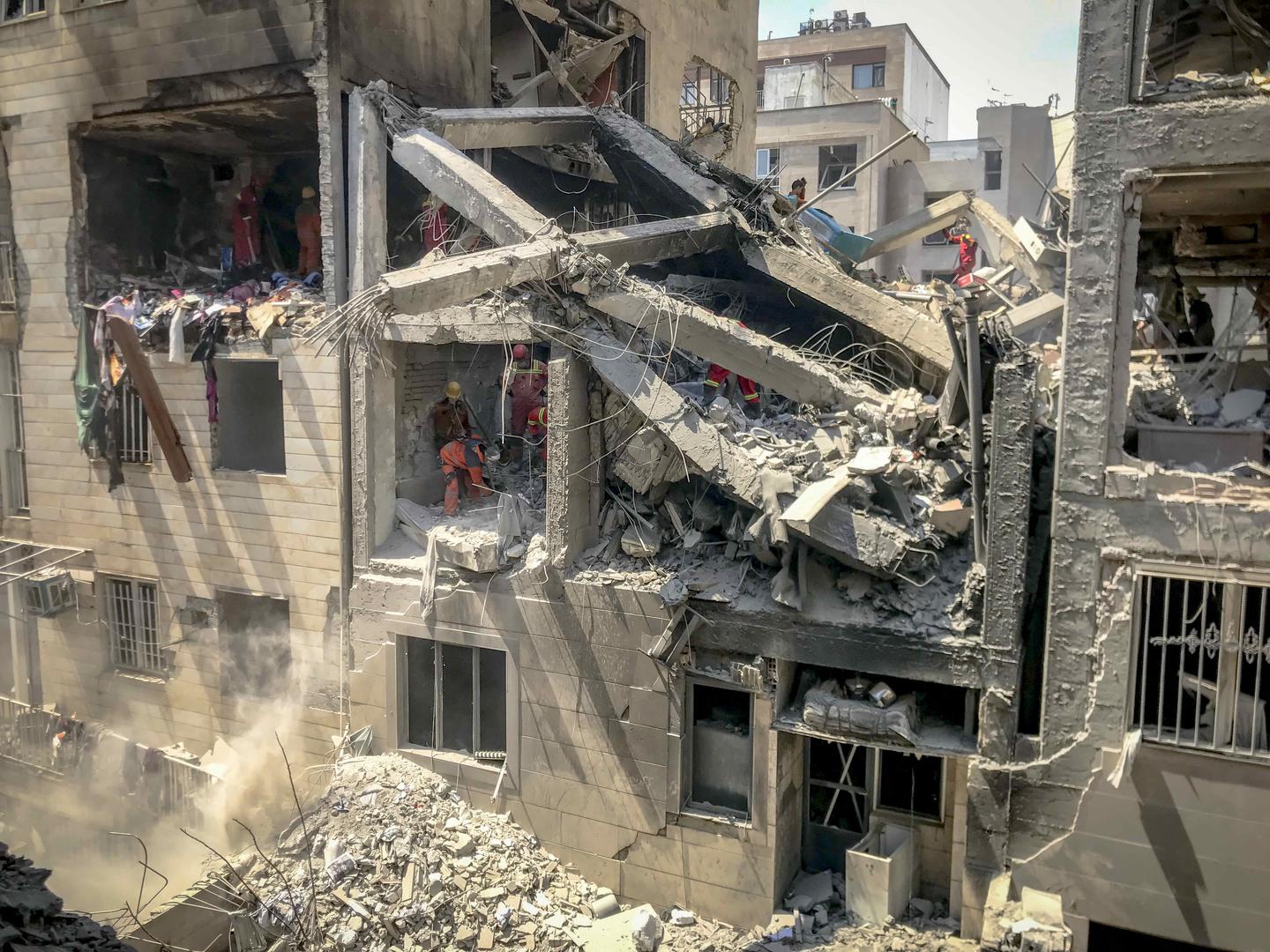 Photo from inside a house across a targeted residential building shows extensive damage in Tehran, Iran, on June 13, 2025. The book title reads "Trout Fishing in America". Photo by Saba/Middle East Images/ABACAPRESS.COM Photo: Middle East Images/ABACA/ABACA
