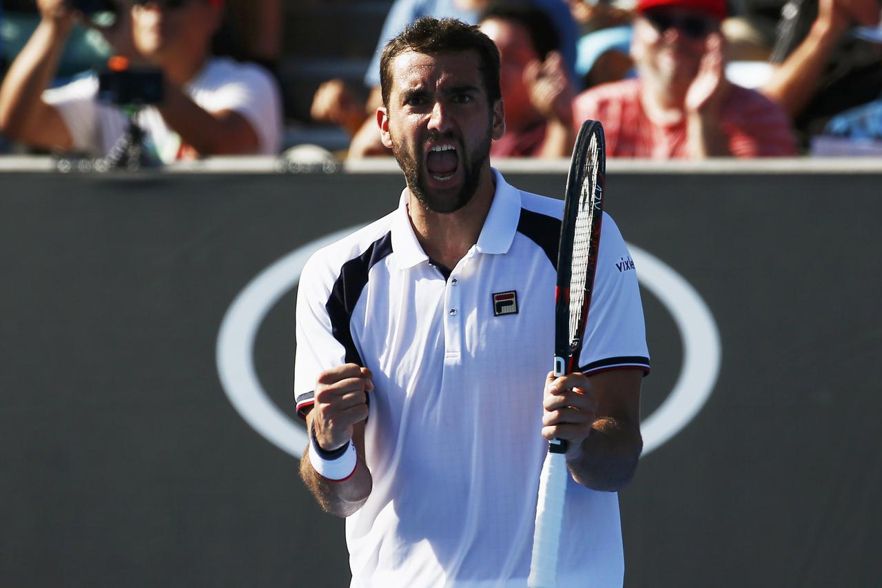 Tennis - Australian Open - Melbourne Park, Melbourne, Australia - 16/1/17 Croatia's Marin Cilic celebrates winning his Men's singles first round match against Poland's Jerzy Janowicz. REUTERS/Edgar Su