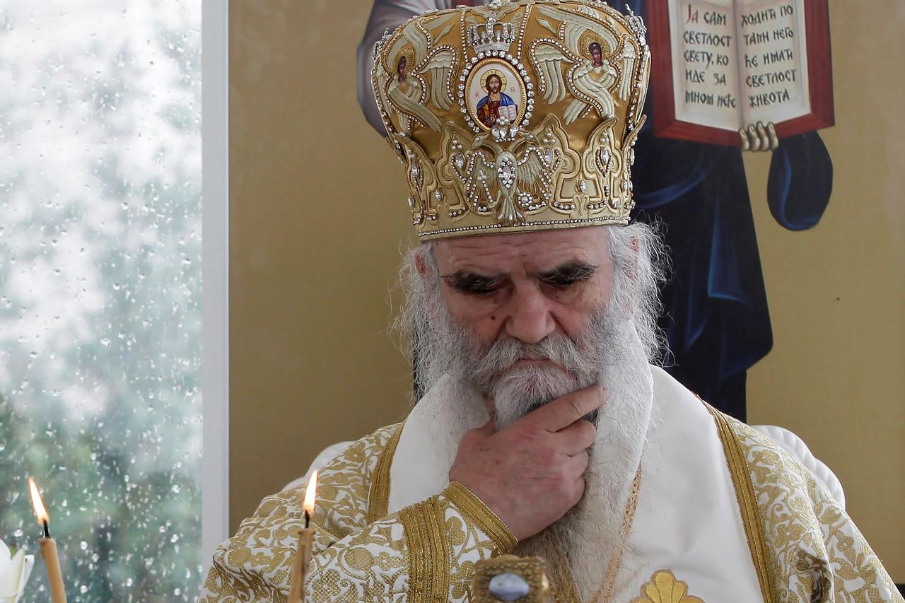 Metropolitan Amfilohije leads a prayer at Ostrog Monastery amid coronavirus restrictions, in Niksic