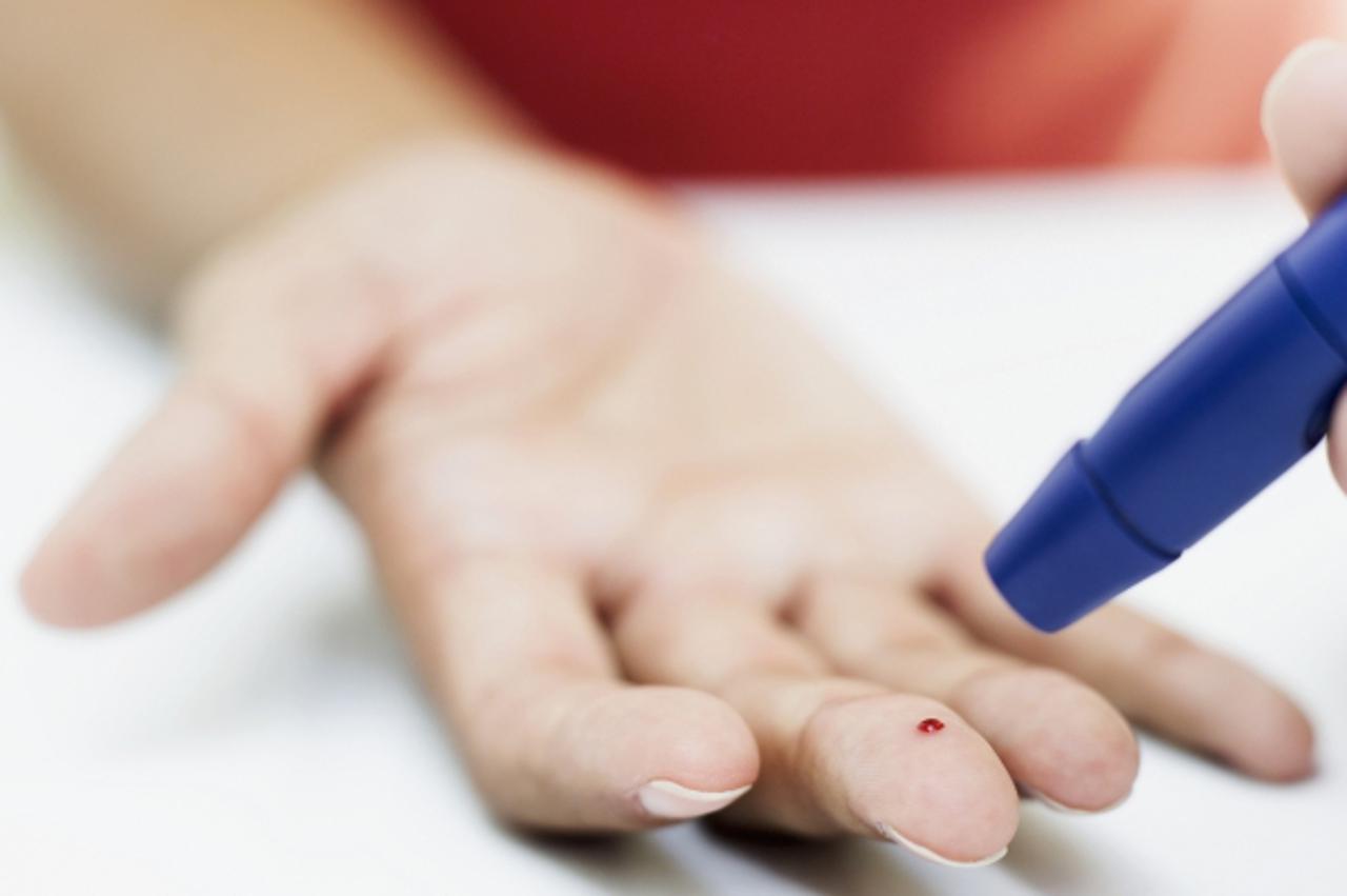 'close-up of a person\'s hand taking a blood test'