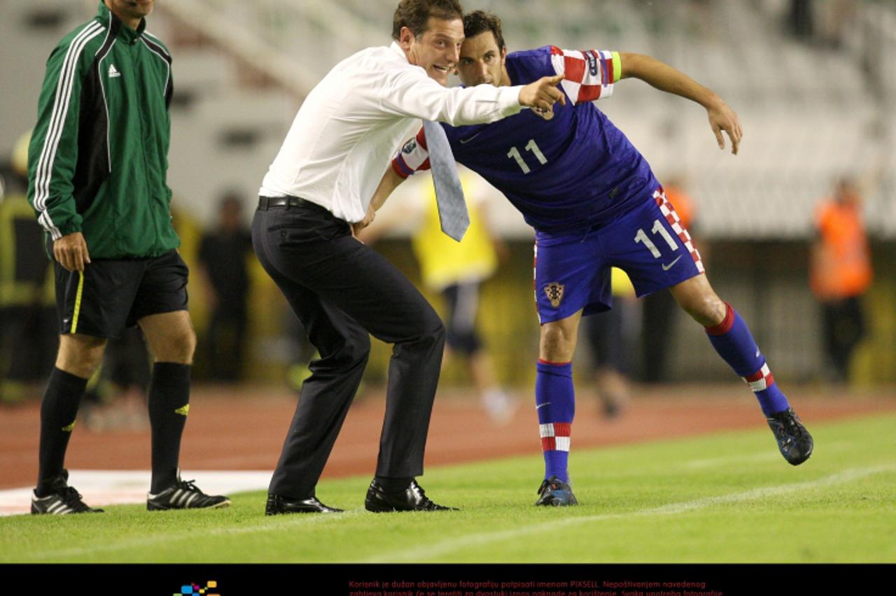 '03.06.2011., Poljud, Split - Kvalifikacijska nogometna utakmica za EURO 2012, Hrvatska - Gruzija. Slaven Bilic i Darijo Srna Photo: Igor Kralj/PIXSELL'