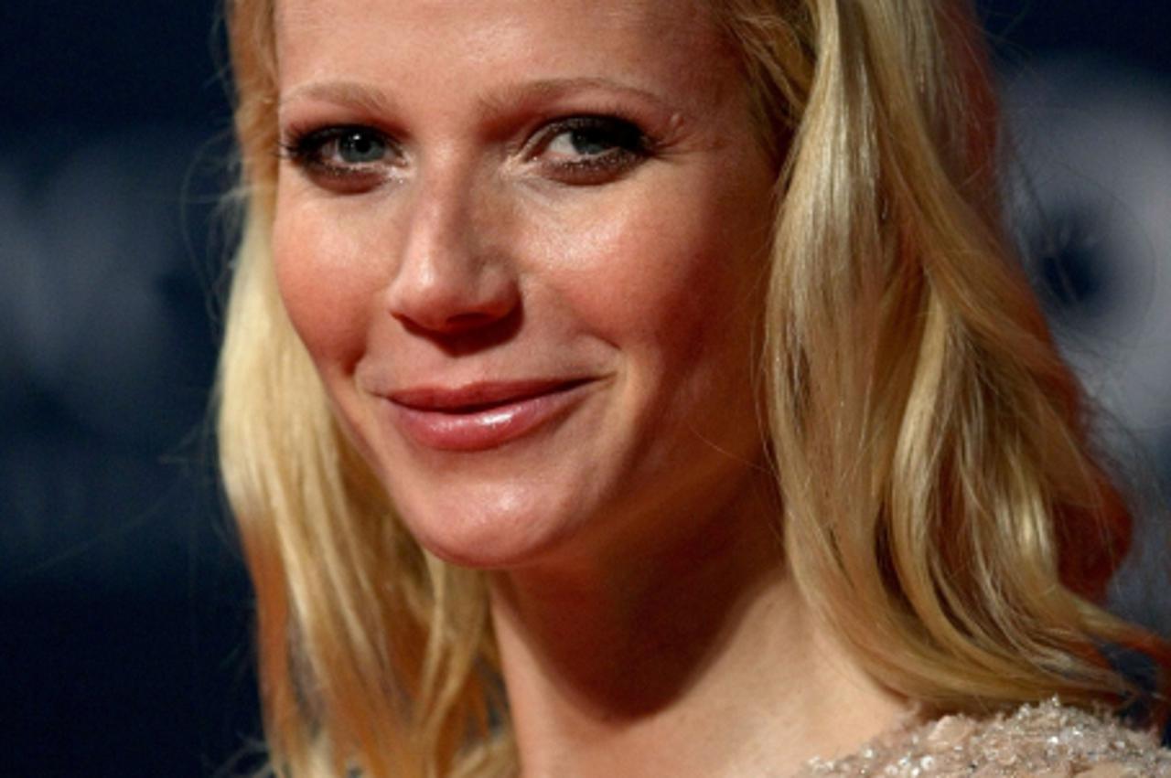 'US actress Gwyneth Paltrow arrives to attend the Laureus World Sports Awards ceremony in Abu Dhabi on March 10, 2010.  AFP PHOTO/MARWAN NAAMANI'