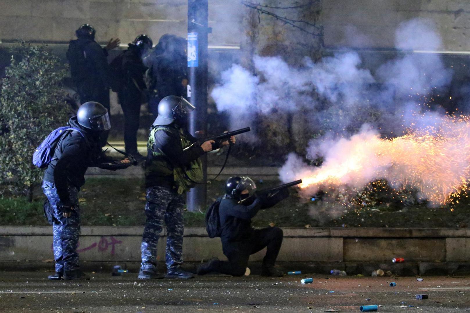 Police officers fire tear gas canisters as supporters of Georgia's opposition parties hold a rally, to protest against the government's decision to suspend talks on joining the European Union, in Tbilisi, Georgia December 3, 2024. REUTERS/Irakli Gedenidze Photo: IRAKLI GEDENIDZE/REUTERS