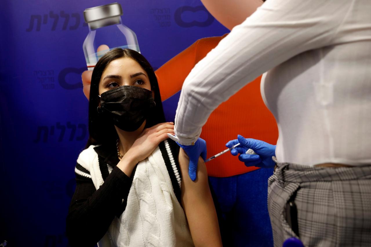 FILE PHOTO: Vaccine vs. variant: Israel's data race to defeat the pandemic