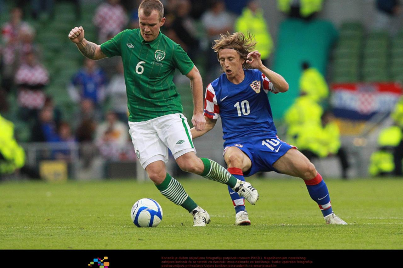 \'Croatia\'s Luka Modric (right) in action with Republic of Ireland\'s Glenn Whelan during the International Friendly at the Aviva Stadium, Dublin. Photo: Press Association/Pixsell\'