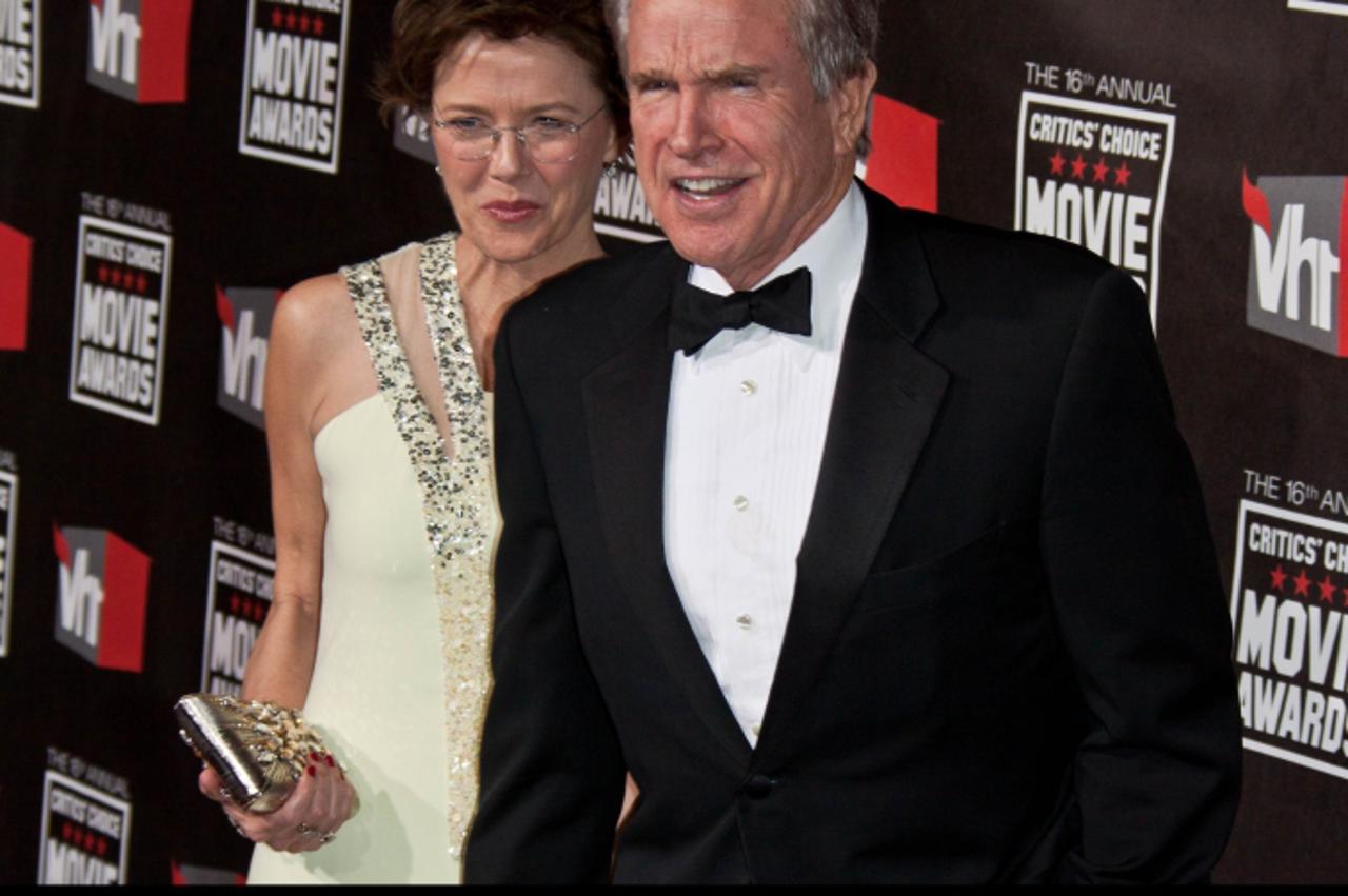 'Actors Warren Beatty and his wife Annette Bening arrive at the 16th Annual Critic\'s Choice Movie Awards presented by the Broadcast Film Critics Association at The Hollywood Palladium in Los Angeles,