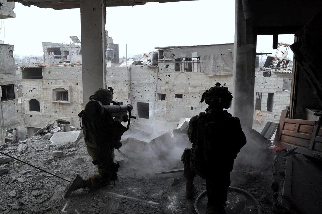 Israeli soldiers take part in an operation against Palestinian Islamist group Hamas, in a location given as Gaza