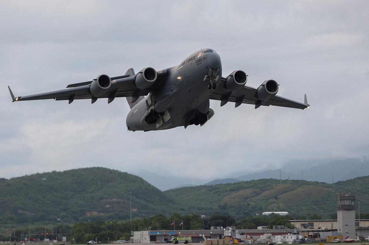A Tennessee Air National Guard Boeing C-17 Globemaster III cargo aircraft from the 164th Airlift Wing takes off from Mercedita International Airport in Ponce.