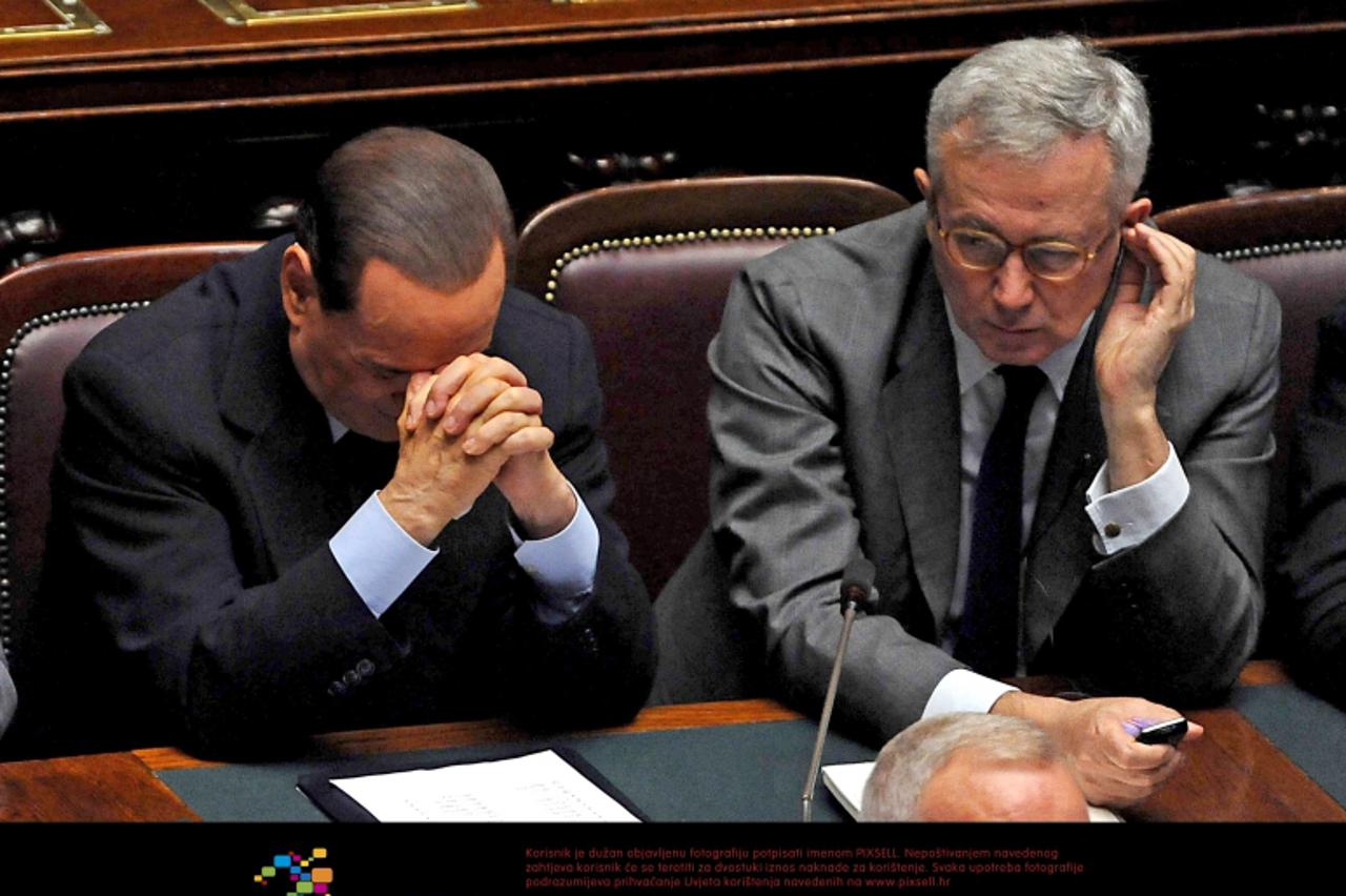 'Italian Prime Minister Silvio Berlusconi speaks in parliament about the financial crisis. Photo: Press Association/Pixsell'