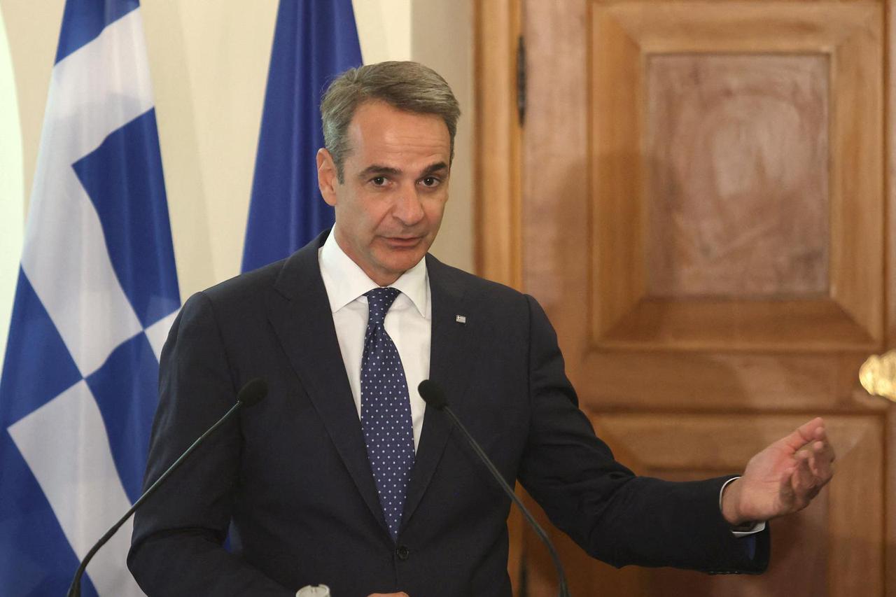 Greek Prime Minister Kyriakos Mitsotakis attends a news conference with Cyprus President Nikos Christodoulides at the Presidential Palace in Nicosia