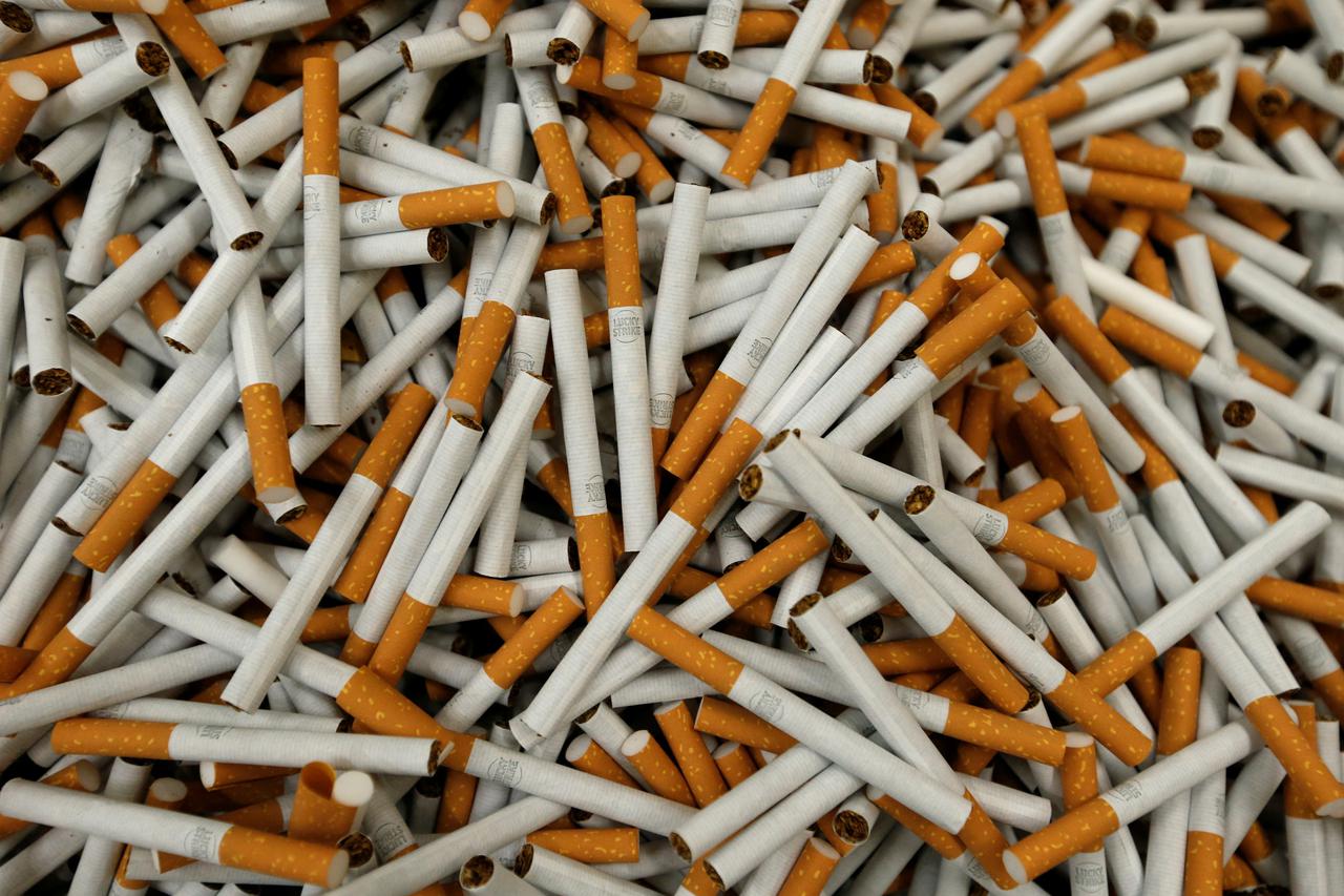 FILE PHOTO: Cigarettes are seen during manufacturing process in BAT Cigarette Factory in Bayreuth