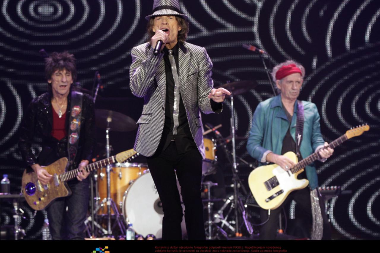 'EDITORIAL USE ONLY. Left to right. Ronnie Wood, Mick Jagger and Keith Richards of The Rolling Stones performing at the O2 Arena in London, as part of their 50th anniversary series of concerts.  Photo