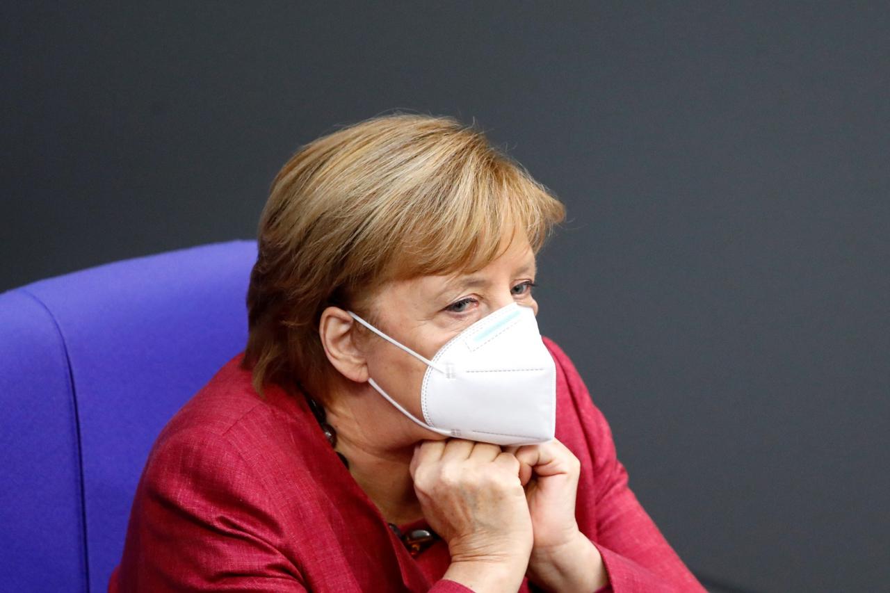 German Chancellor Angela Merkel attends a session of the Bundestag, in Berlin