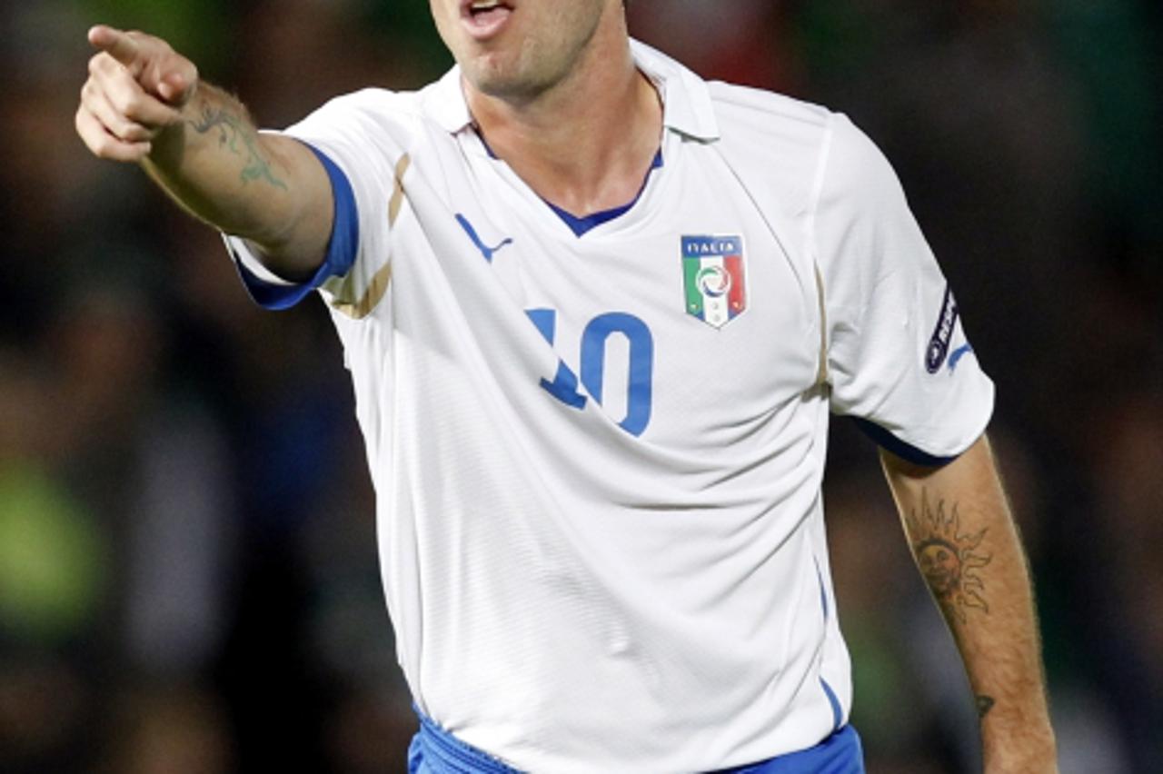 'Italy\'s Antonio Cassano reacts during their Euro 2012 qualifying soccer match against Northern Ireland at Windsor Park stadium in Belfast October 8, 2010. REUTERS/Giampiero Sposito (NORTHERN IRELAND