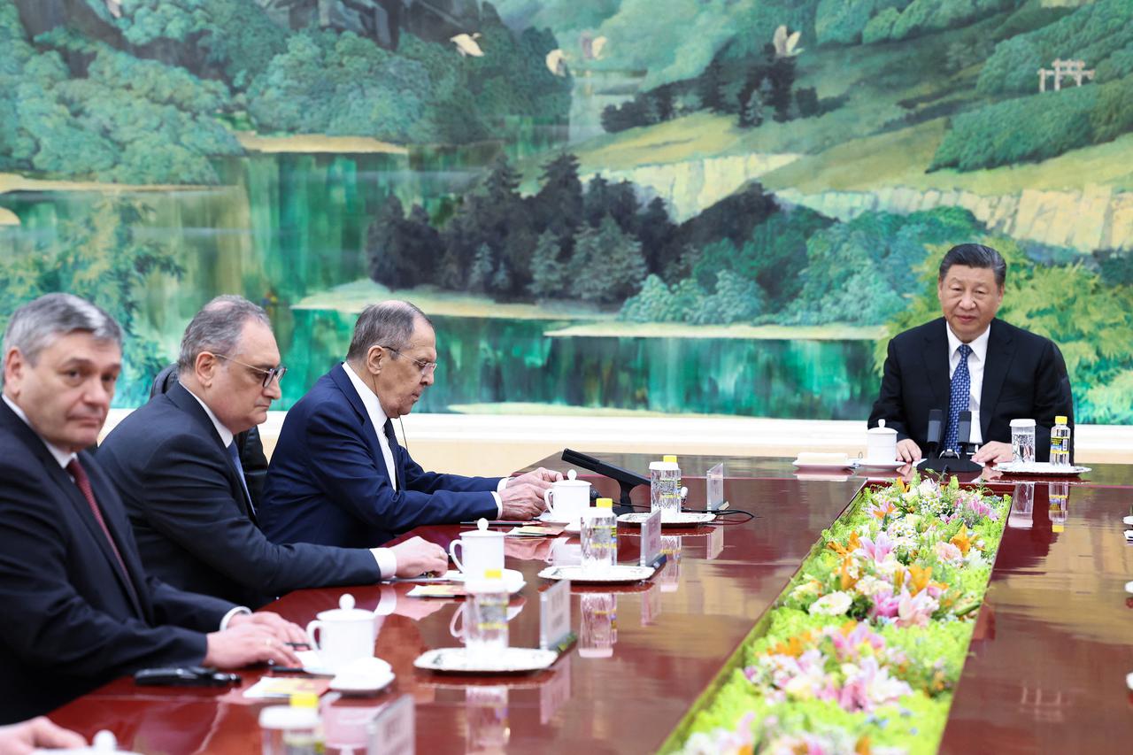 Russian Foreign Minister Sergei Lavrov meets with Chinese President Xi Jinping in Beijing