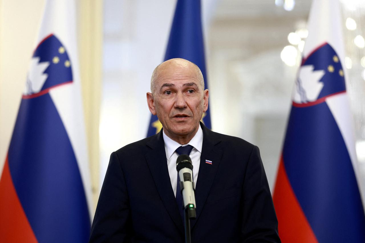 Slovenia's new Prime Minister Janez Jansa speaks at a news conference after the signing of the new government in Ljubljana