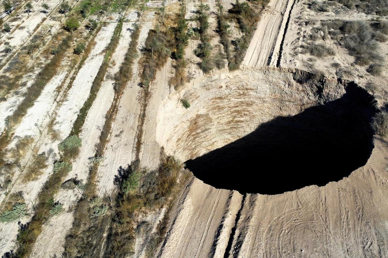 FILE PHOTO: A sinkhole is exposed close to Tierra Amarilla town, in Copiapo