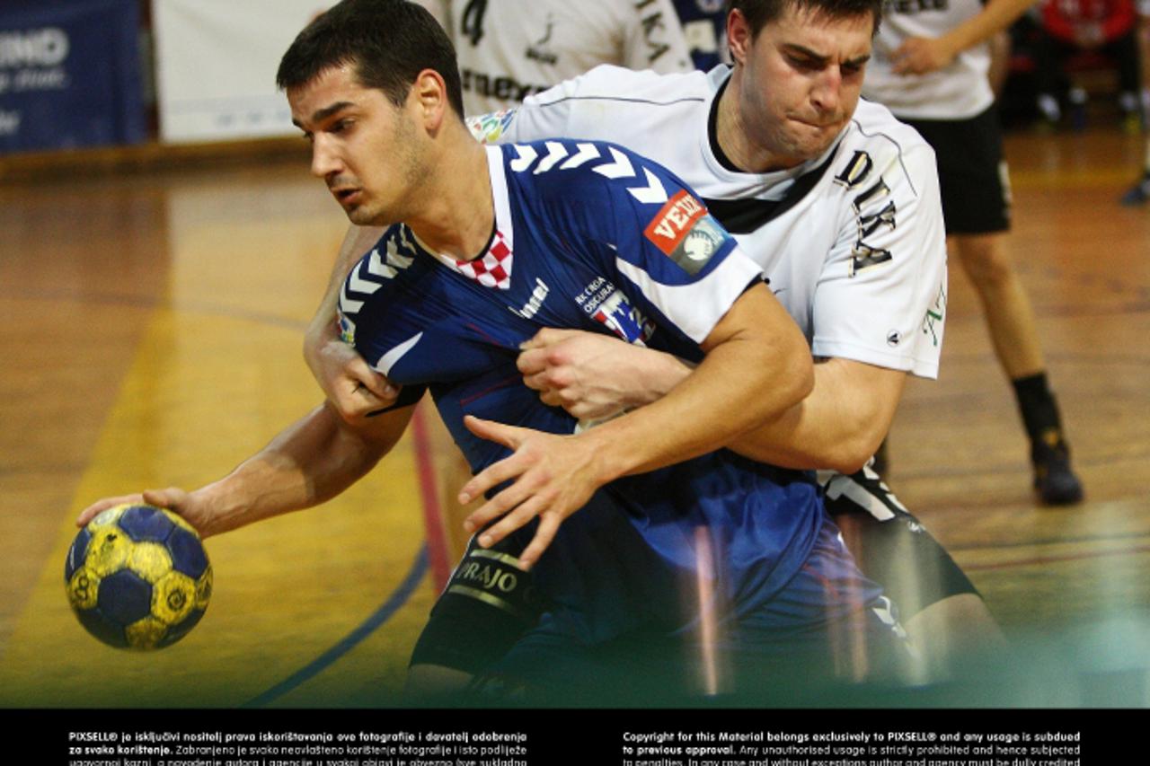 '11.12.2011., Zagreb, Kutija sibica, SEHA rukometna liga: RK CO Zagreb - RK Nexe. Josip Valcic, Nikola Kedzo Photo: Zeljko Hladika/PIXSELL'