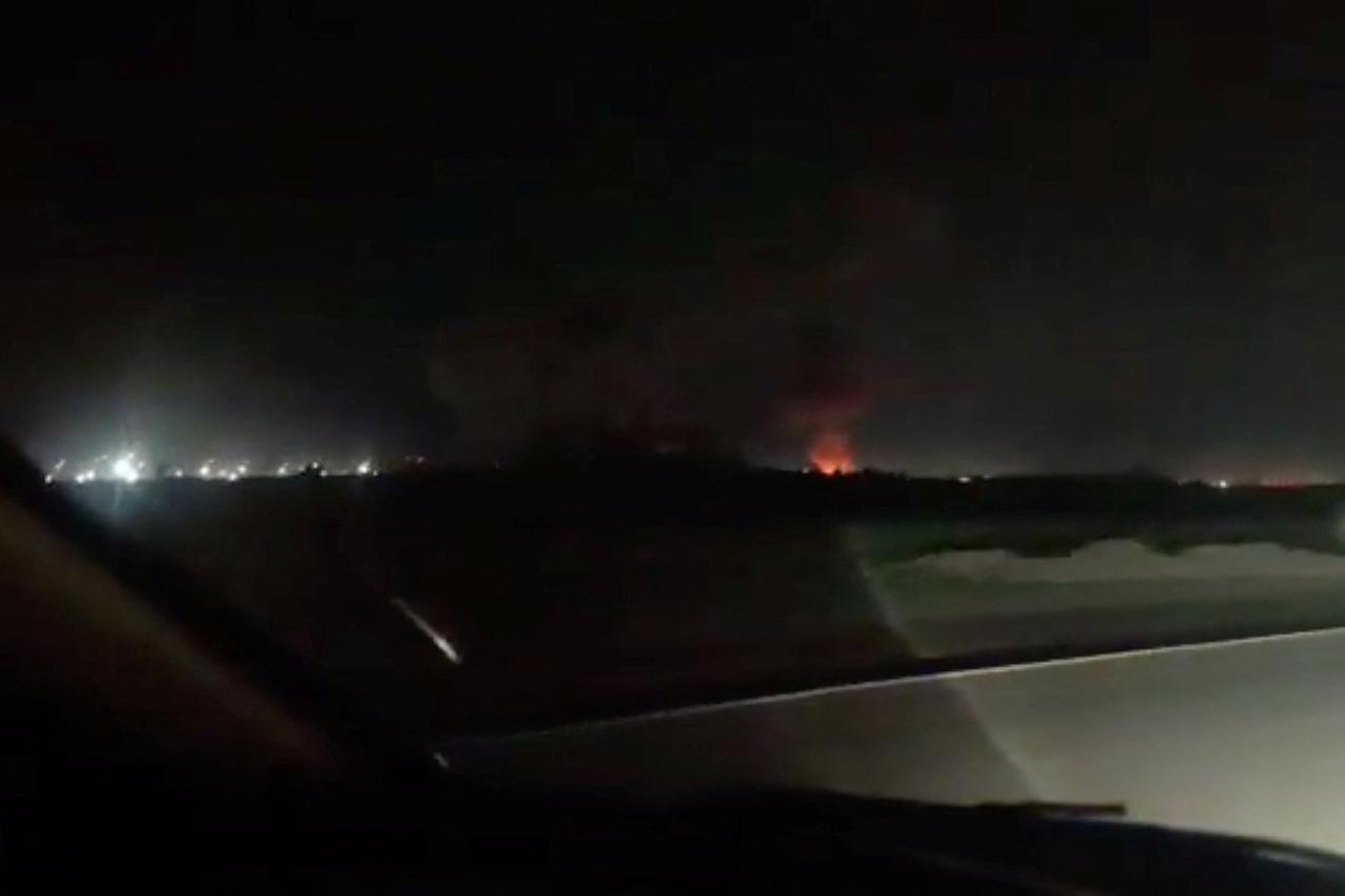 Fire and smoke rise from the direction of Iranshahr airport