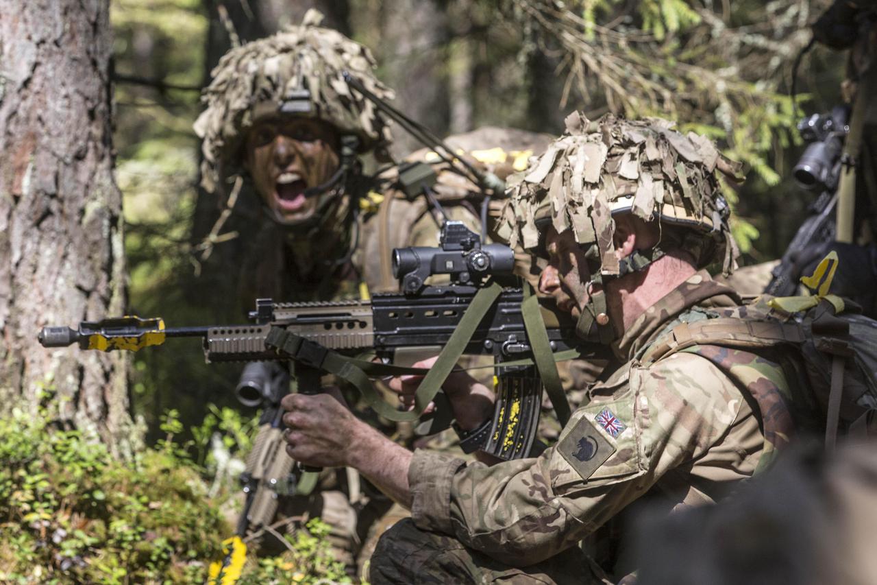 Soldiers of Burma Company 1st Battalion The Duke of Lancaster's Regiment take part in Exercise Steadfast Javelin in the forests of south Estonia, sixty miles from the Russian border. The exercise has 6000 NATO troops taking part from nine different countr