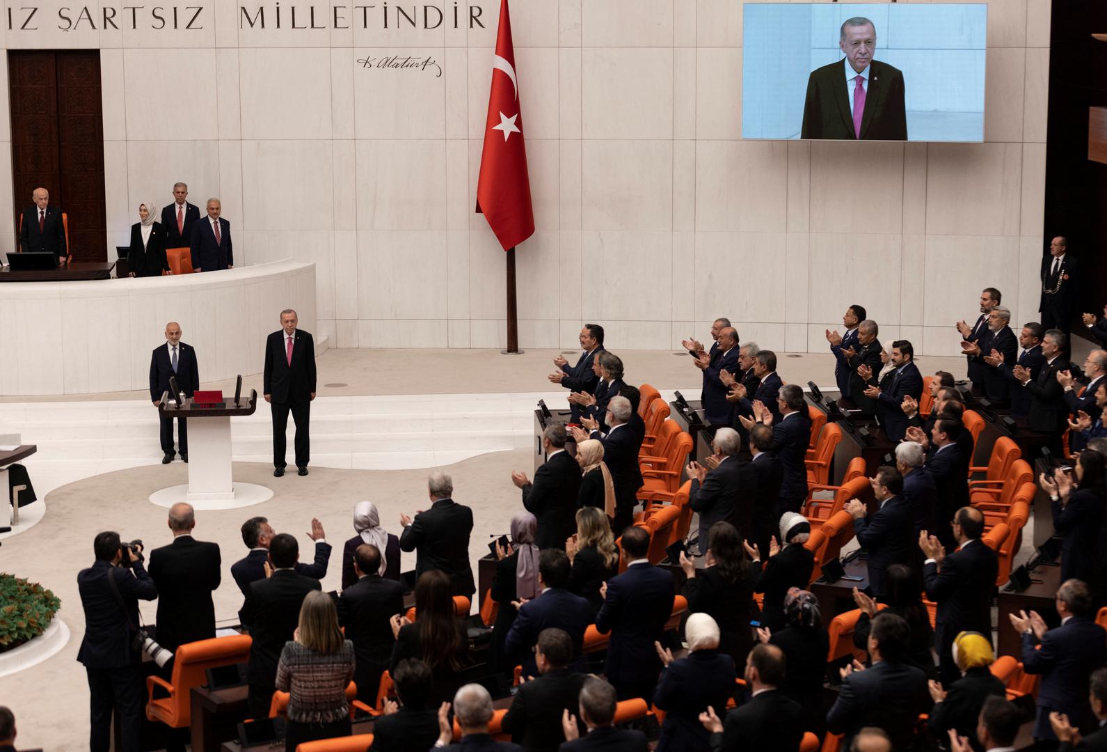 Turkish President Tayyip Erdogan greets members of the parliament and guests as he arrives to take his oath after his election win in Ankara, Turkey, June 3, 2023. REUTERS/Umit Bektas Photo: UMIT BEKTAS/REUTERS