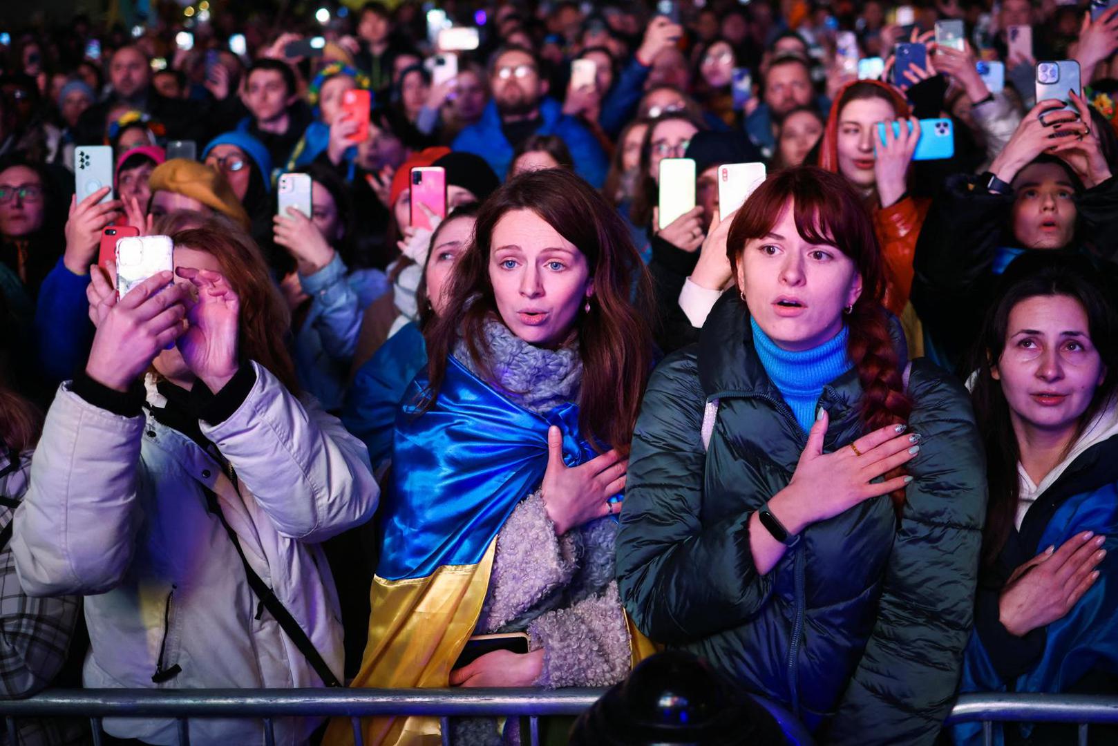 People attend a vigil for Ukraine held on the anniversary of the conflict with Russia, at Trafalgar Square in London, Britain February 23, 2023. REUTERS/Henry Nicholls Photo: Henry Nicholls/REUTERS