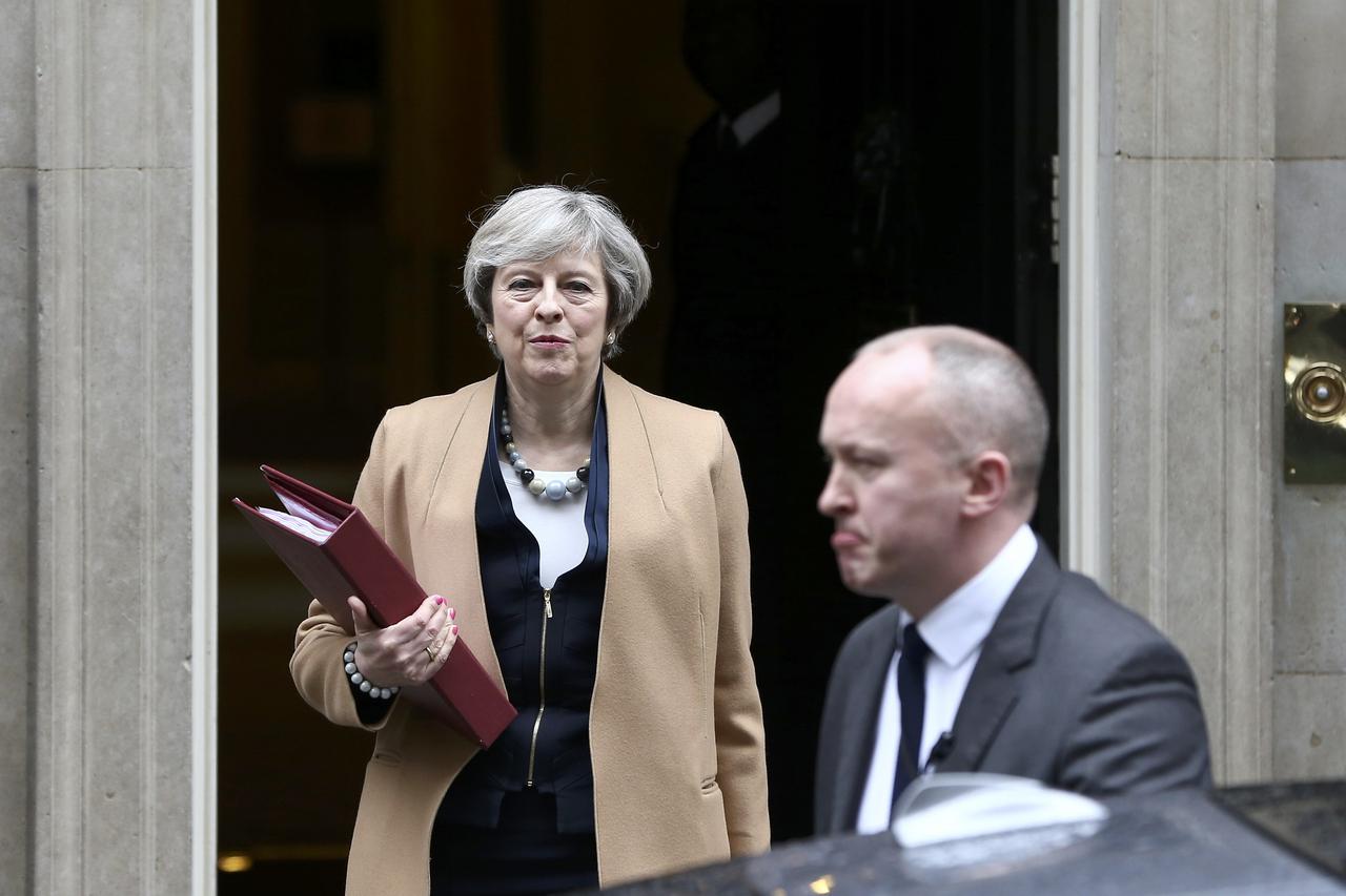 Britain's Prime Minister Theresa May leaves 10 Downing Street before Chancellor of the Exchequer Philip Hammond delivers his budget to the House of Commons in London, Britain March 8, 2017.     REUTERS/Neil Hall
