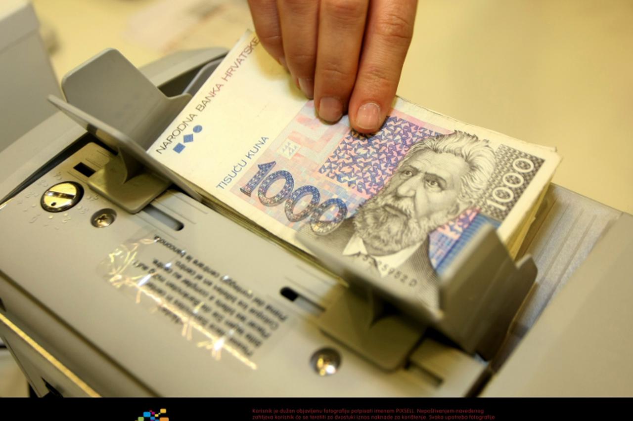 '22.12.2008., Zagreb - Erste Banka. Snimanje ilustracije - koristenje usluga banke i komunikacija s osobnim bankarom. Photo: Davor Puklavec/24sata'