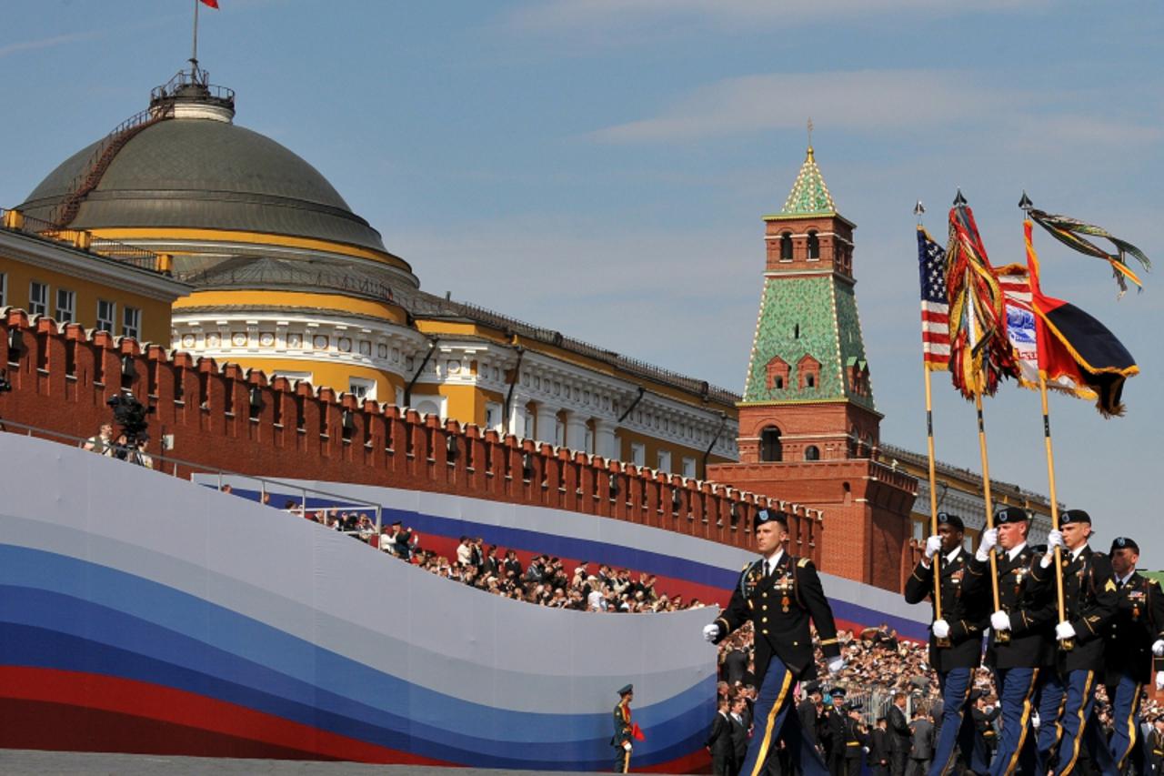 'US soldiers march through Red Square during the Victory Day parade in Moscow on May 9, 2010.  Troops from four NATO states marched through Red Square for the first time Sunday as Russia marked victor