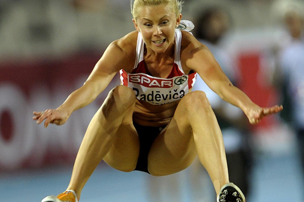 'Latvia\'s Ineta Radevica competes during the women\'s long jump at the 2010 European Athletics Championships at the Olympic Stadium in Barcelona on July 28, 2010. AFP PHOTO / MIGUEL RIOPA'