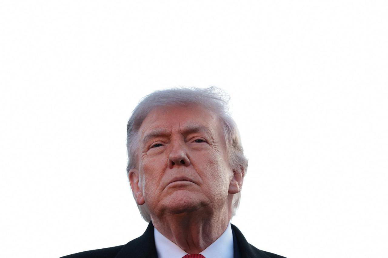 U.S. President Donald Trump near the Lincoln Memorial Reflecting Pool, in Washington
