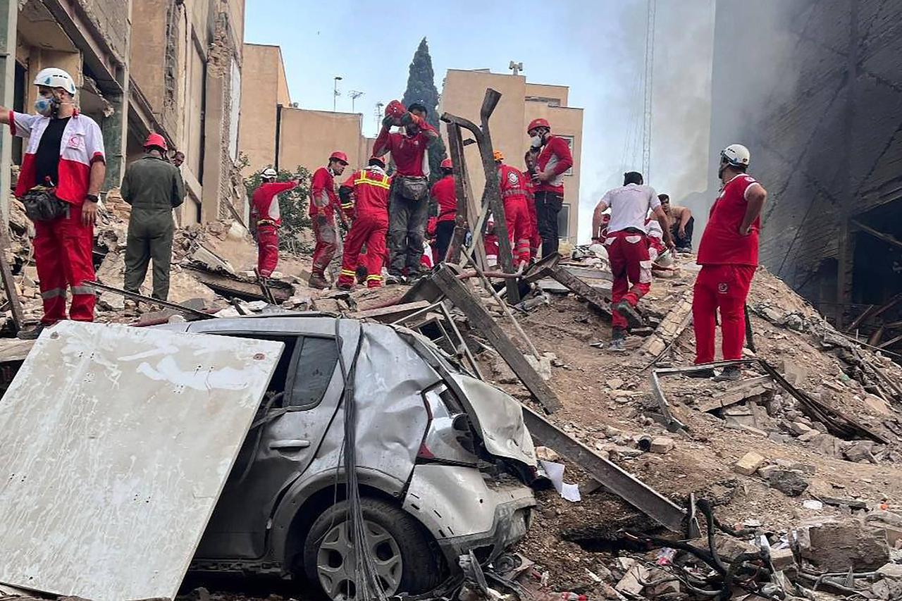 Iran Rescuers Search Bombed Buildings After US-Israeli Strike