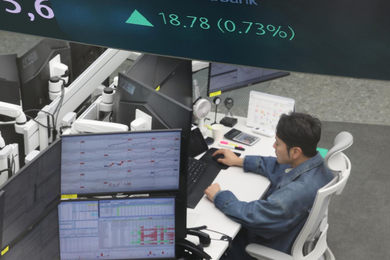 Seoul shares open higher