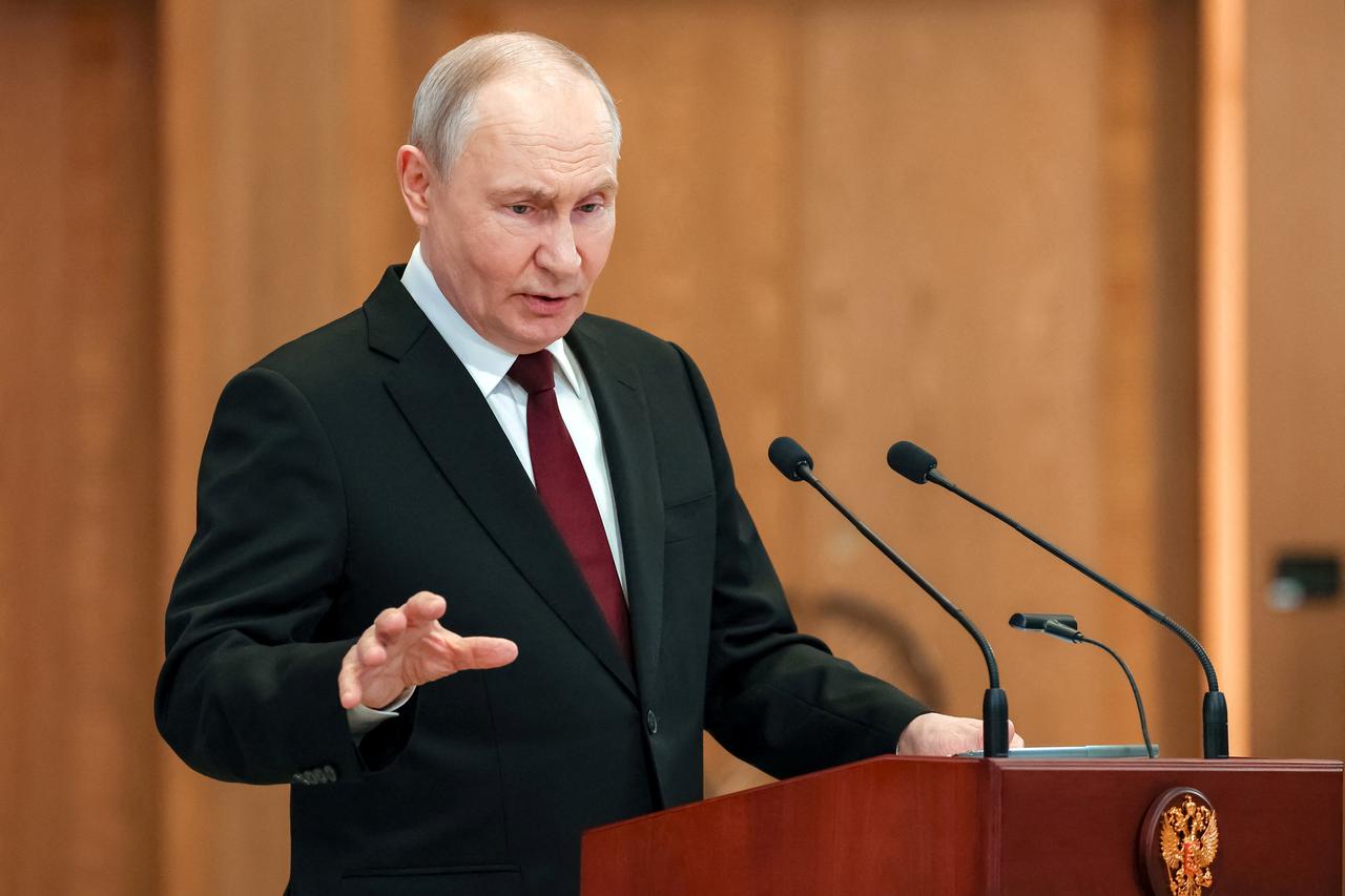 Russian President Vladimir Putin holds a press conference in Astana