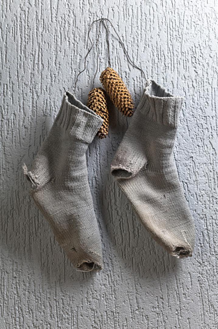 Isto tako možete napraviti i hladni oblog, samo u čarapu stavite kockice leda. 