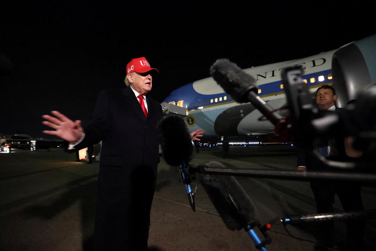 U.S. President Donald Trump disembarks Air Force One as he arrives at Joint Base Andrews in Maryland
