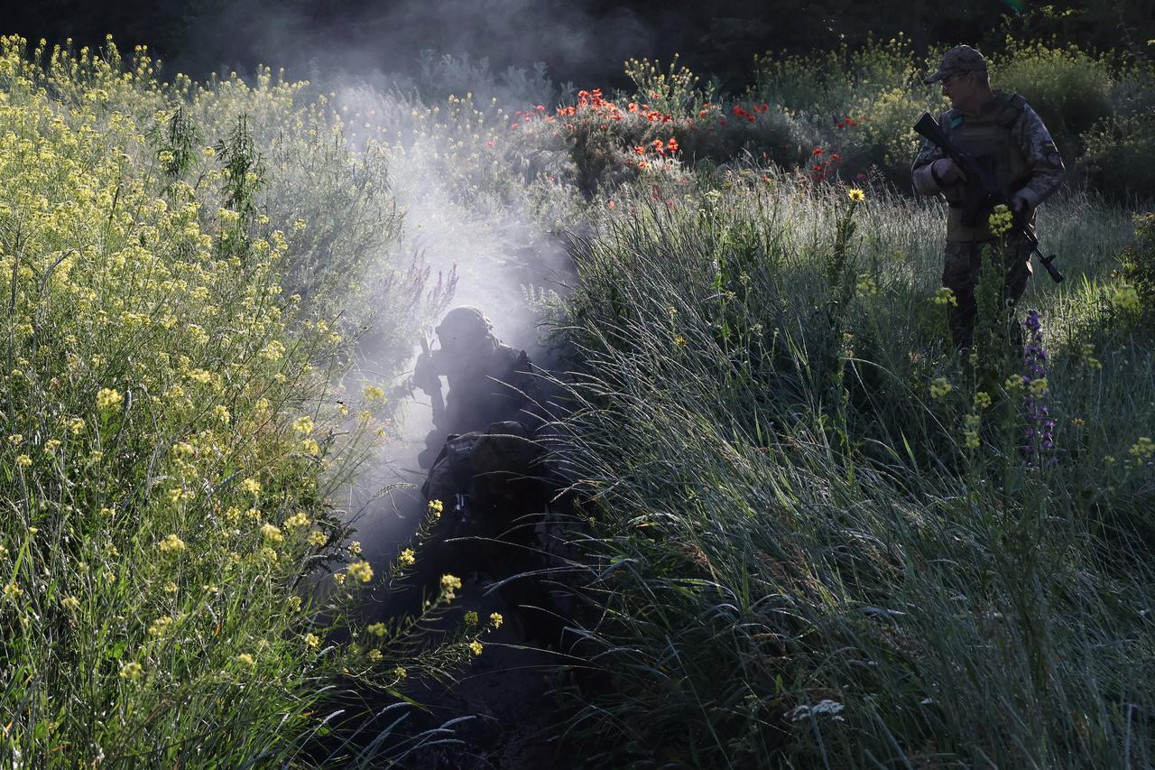 Ukrainian service members attend a military training near a frontline in Zaporizhzhia region