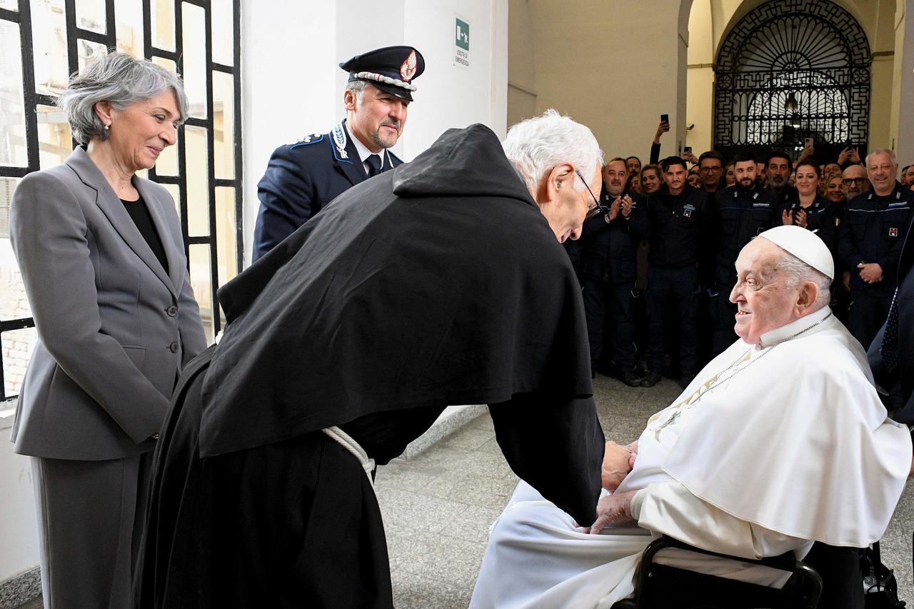 Pope Francis visits Regina Coeli prison in Rome